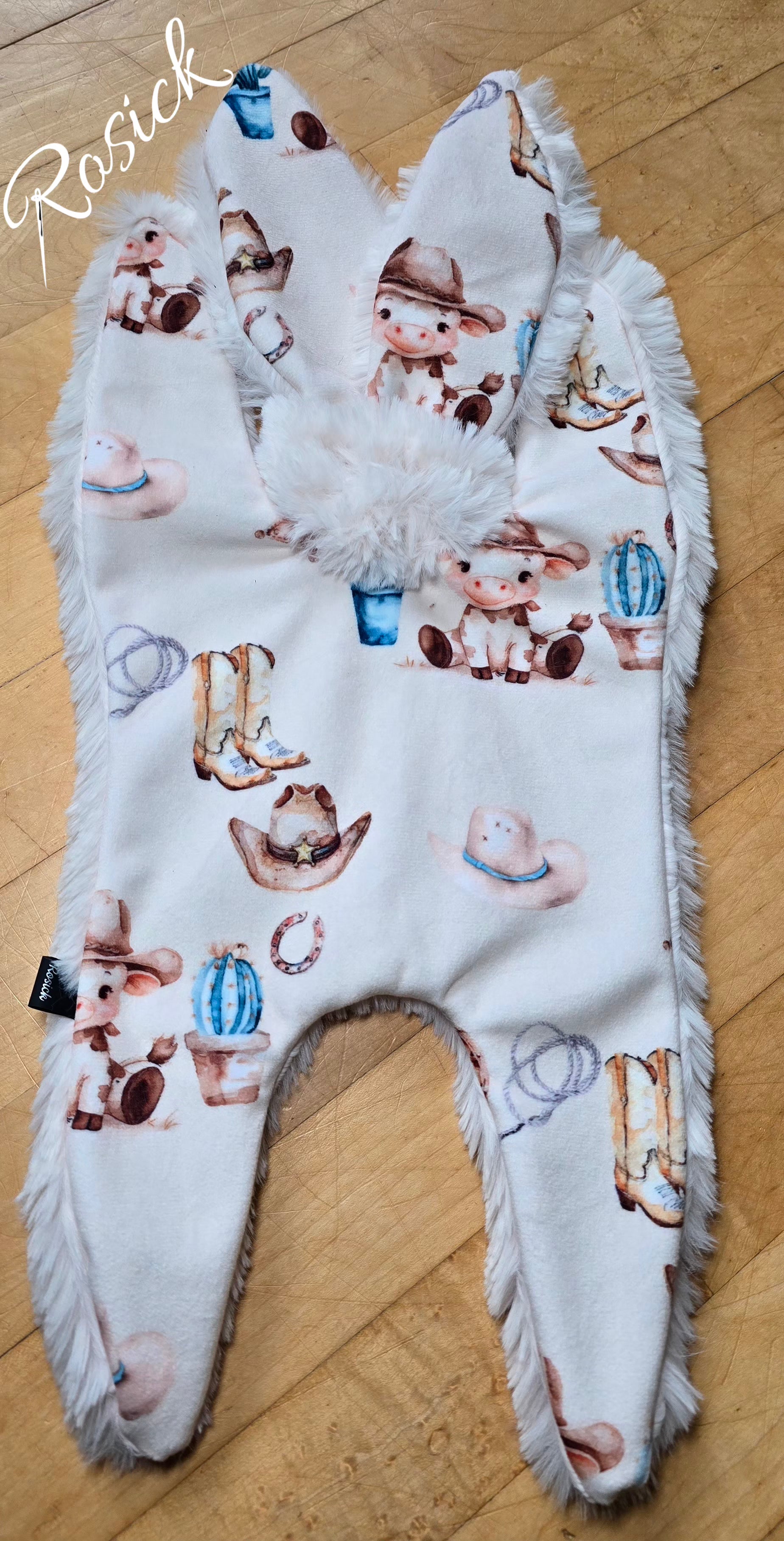 Bébé vache cowboy